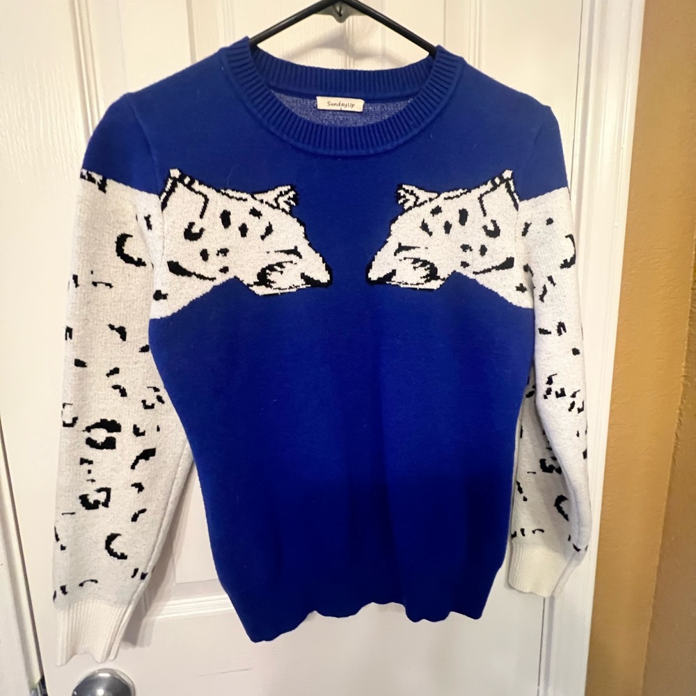Sunday Up fun blue sweater with white and black animal print arms, size S